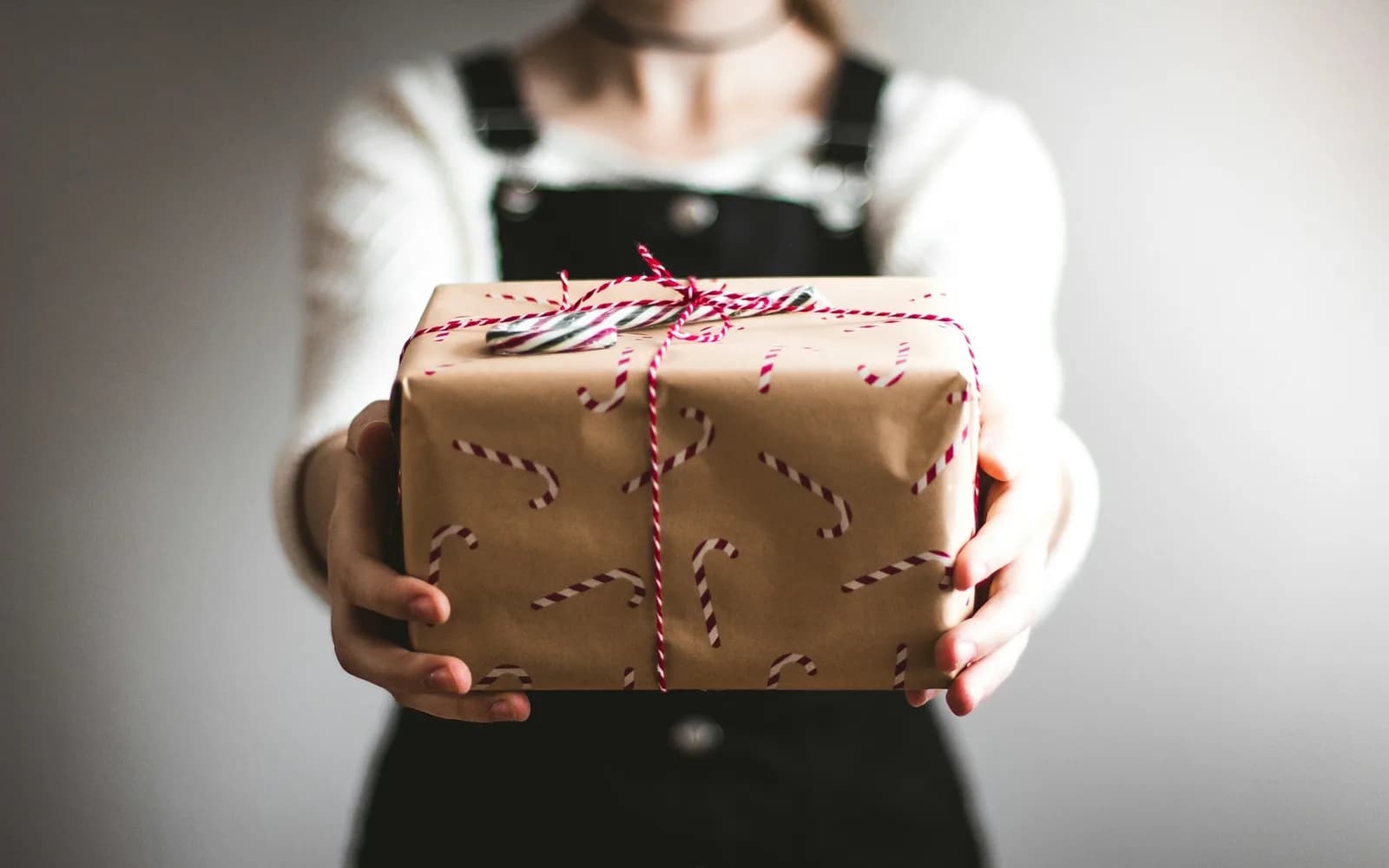 A carefully wrapped gift parcel prepared for shipping from Canada to India