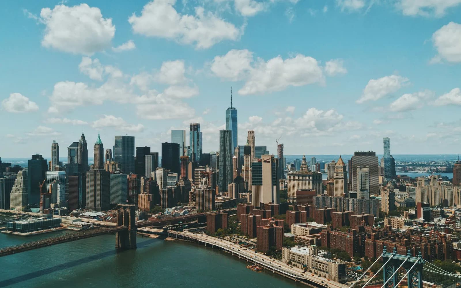 The New York City skyline and its bridges, one of the US destinations we ship parcels to from Canada